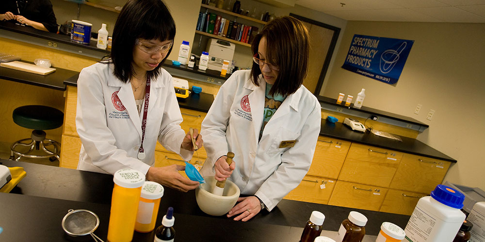 professor and student in a lab